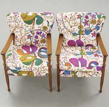 A pair of Josef Frank mahogany armchairs for Svenskt Tenn, model 891.