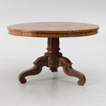 A mahogany salon table, around the mid-19th Century.