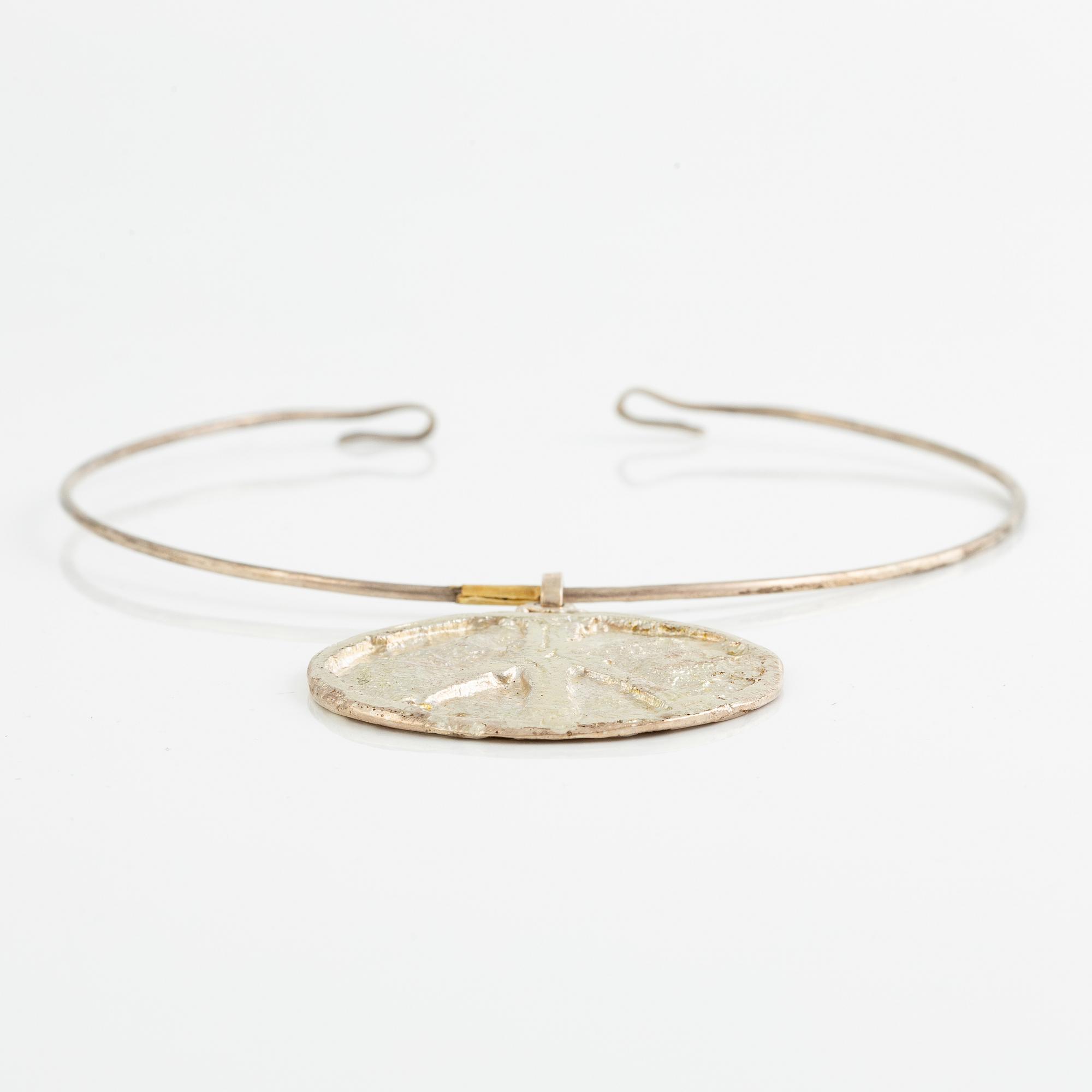 Lars Arby, three neck rings with pendants, silver, Gothenburg including 1977, 1978, and 1982.