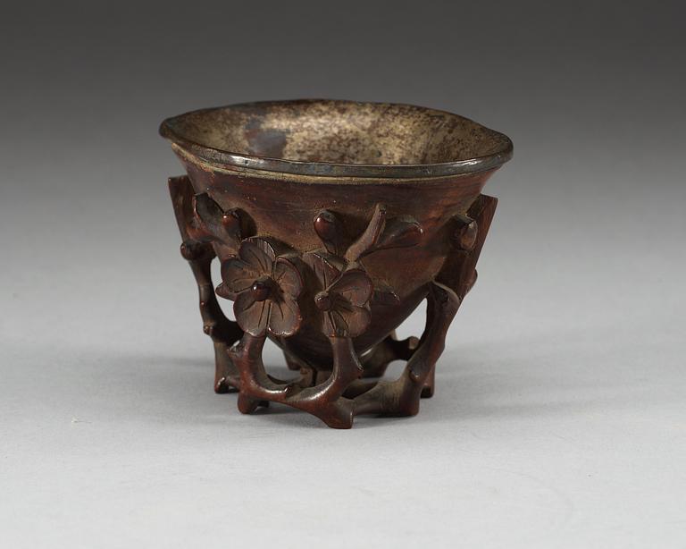A carved bambu libation cup, Qing dynasty.