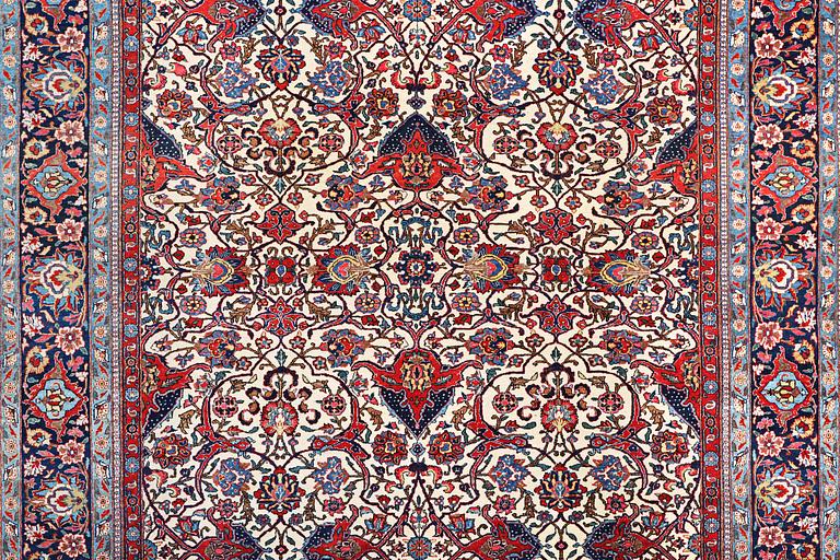 A semi.antique Kashan, c. 319 x 212 cm.