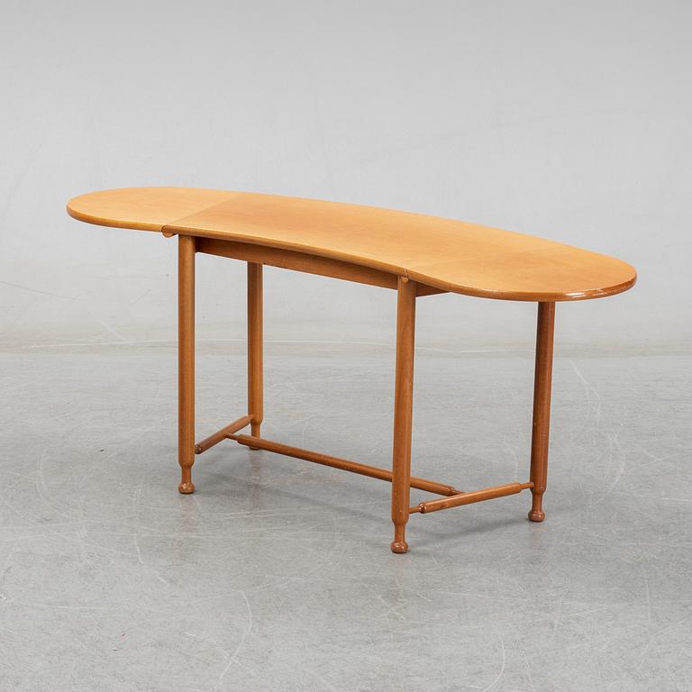 Josef Frank, a model 1133 folding table by Svenskt Tenn, Sweden.