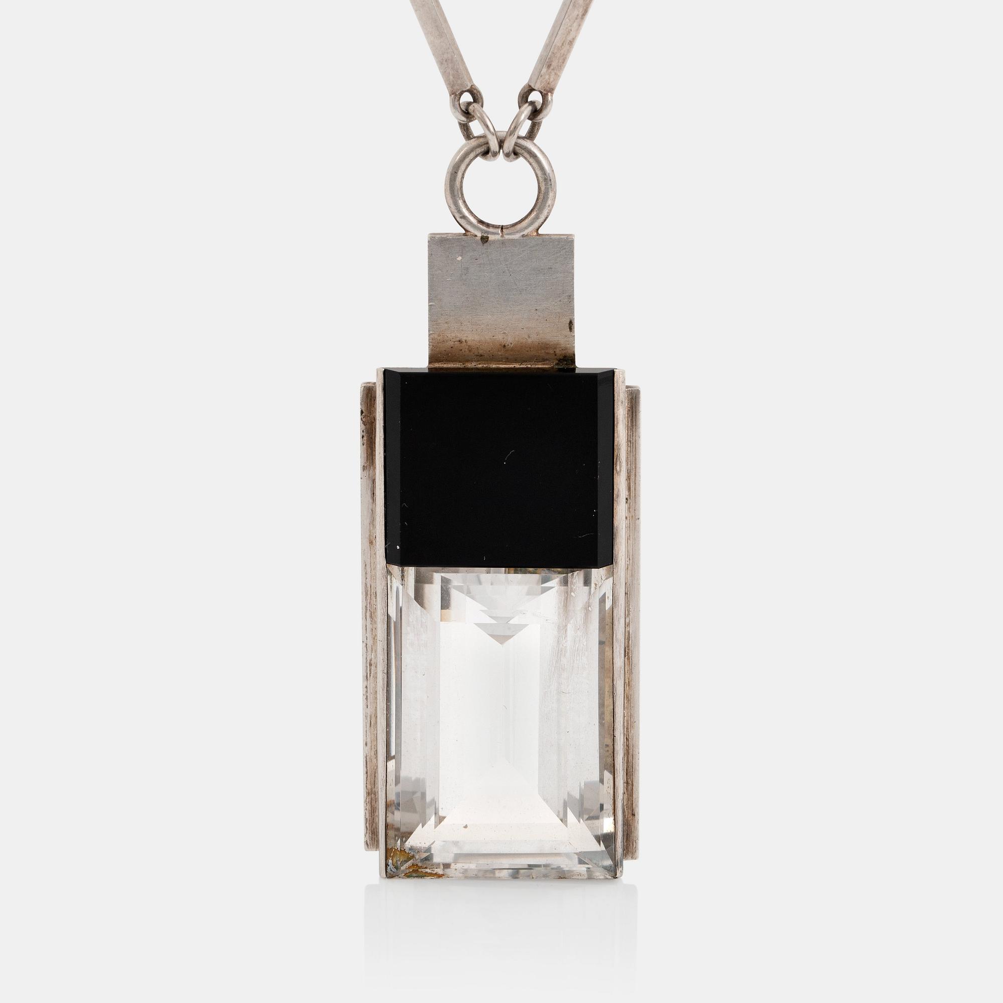 Wiwen Nilsson, a sterling silver, rock crystal and onyx pendant with chain, Lund Sweden 1937.