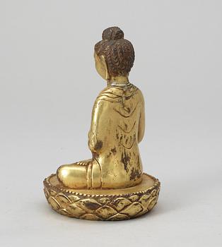 A gilt bronze Buddha, late Qing dynasty.