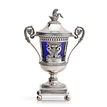 108. A French silver urn with lid and blue glass, early 19th century.