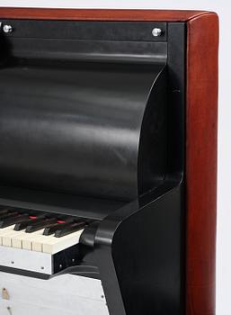 Poul Henningsen, a "PH Upright Piano", executed by Andreas Christensen, Denmark, 1940s.