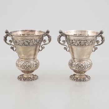 A pair of silver vases, John & Frank Pairpoint, London, England, 1895.