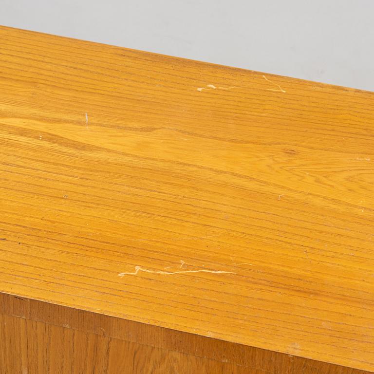 An elm wood veneered dresser, mid 20th Century.