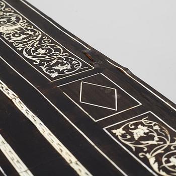 A Renaissance-style ebony, ebonized and ivory-inlaid library table, late 19th century, presumably Germany.