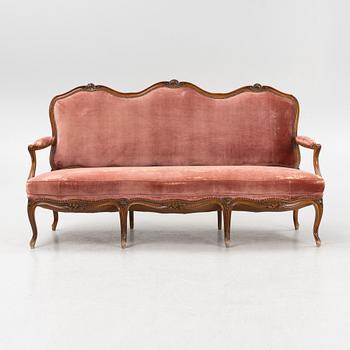 A rococo style sofa, end of the 20th Century.