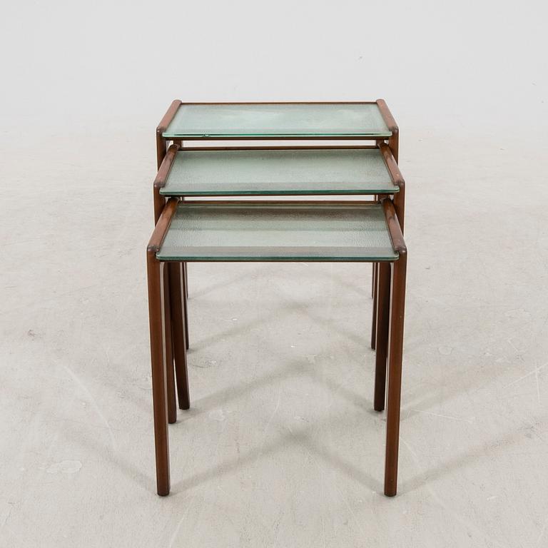 A 1950s mahogany nesting table.