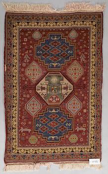 A 1940's Spanish rug Of Kazak design, ca. 139 x 93 cm.