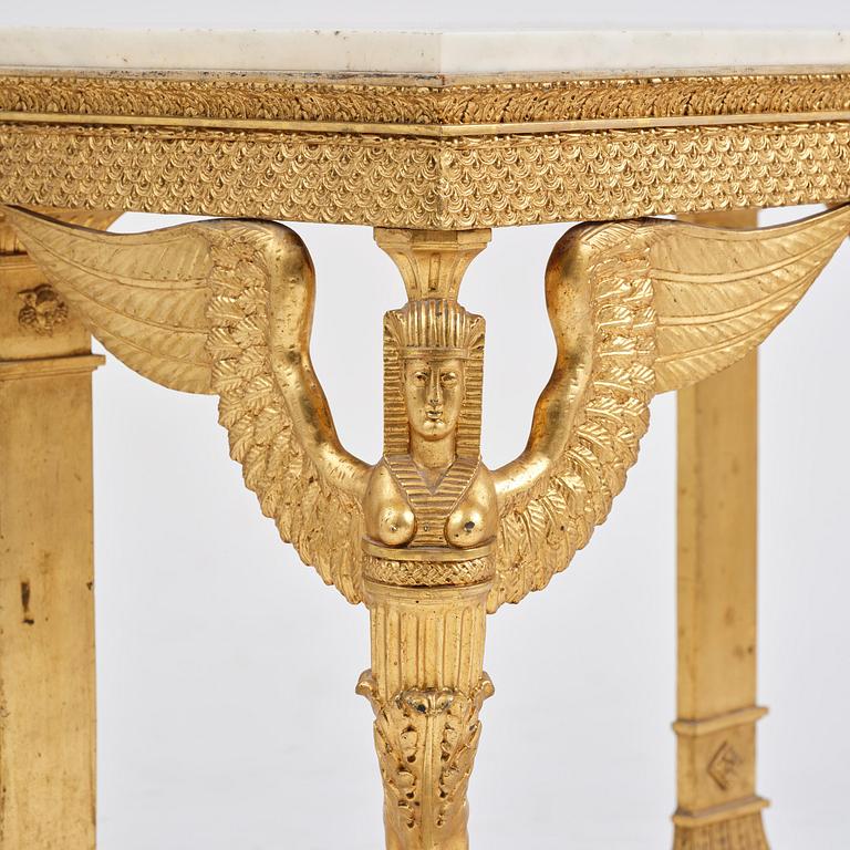 A late Gustavian giltwood console in the manner of J. Frisk, Stockholm, early 19th century.