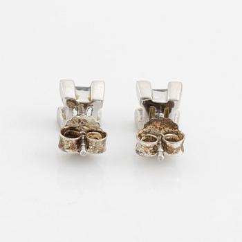 Ring, pendant, and a pair of earrings, 18K white gold with topaz and small diamonds.