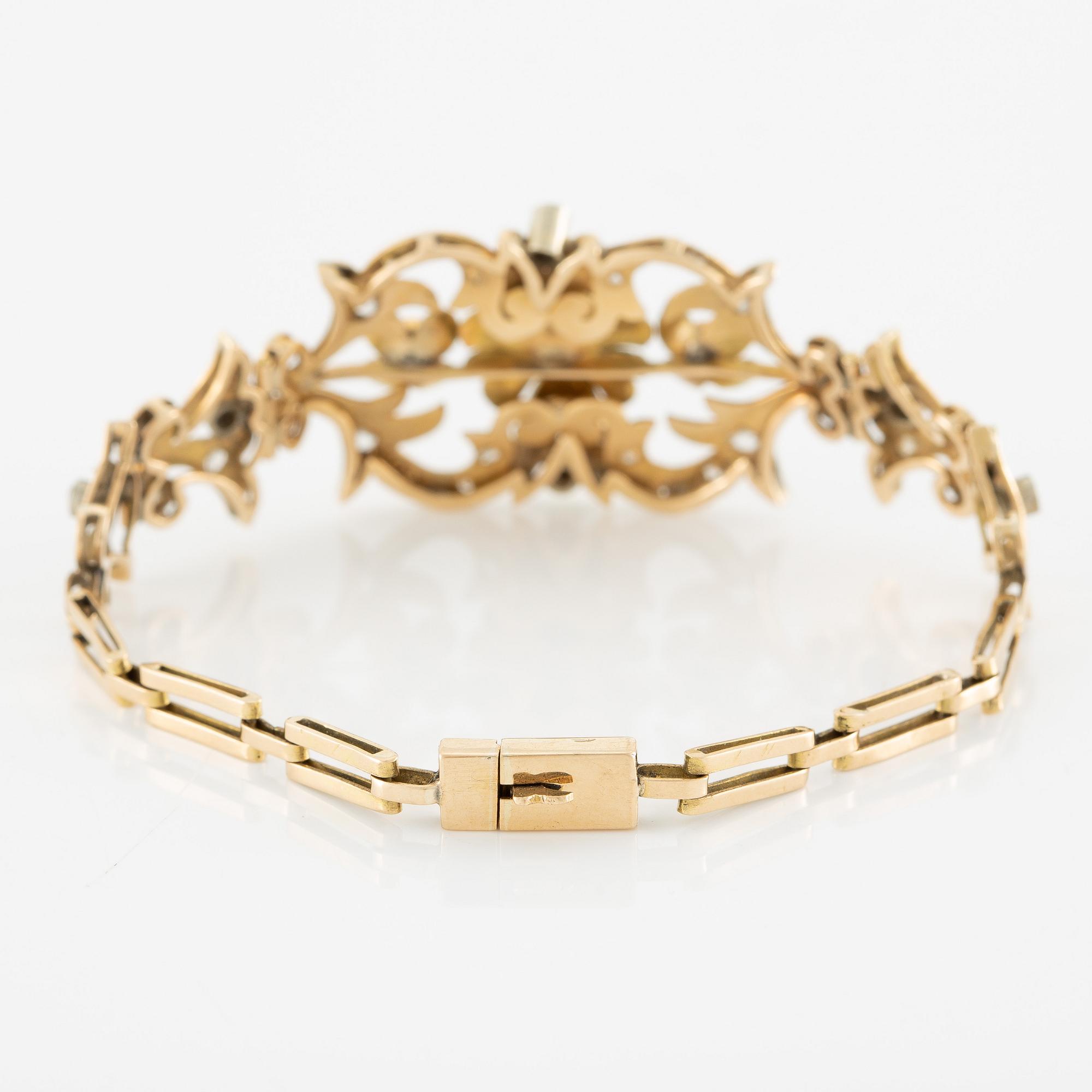 Necklace and bracelet in with floral motif set with cabochon-cut emeralds and rose-cut diamonds.