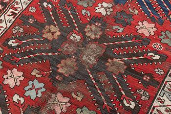 Rug, "Sunburst", Kazak, circa 250 x 137 cm.