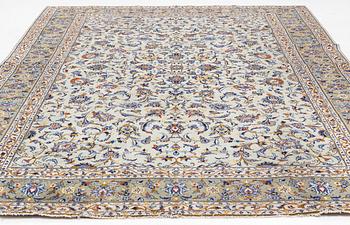 A Kashan carpet, approximately 368 x 280 cm.