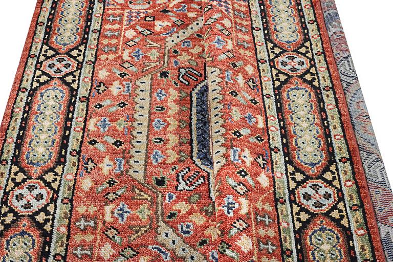A carpet of Mamluk design, c. 307 x 243 cm.