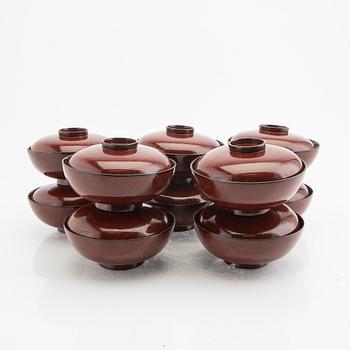 A set of 10 Japanese Meiji lacquered bowls with lids in original box.