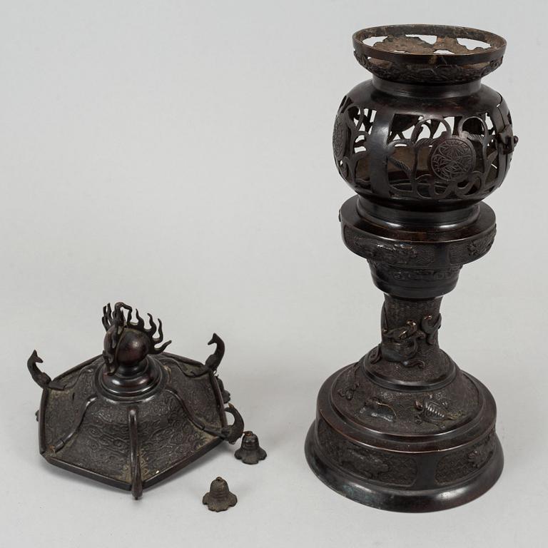 A 20th century Japanese bronze light holder pagoda.