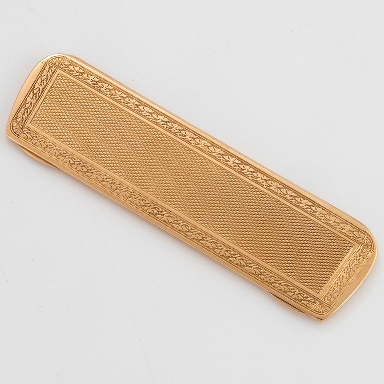 Hübner fodral 14K guld.