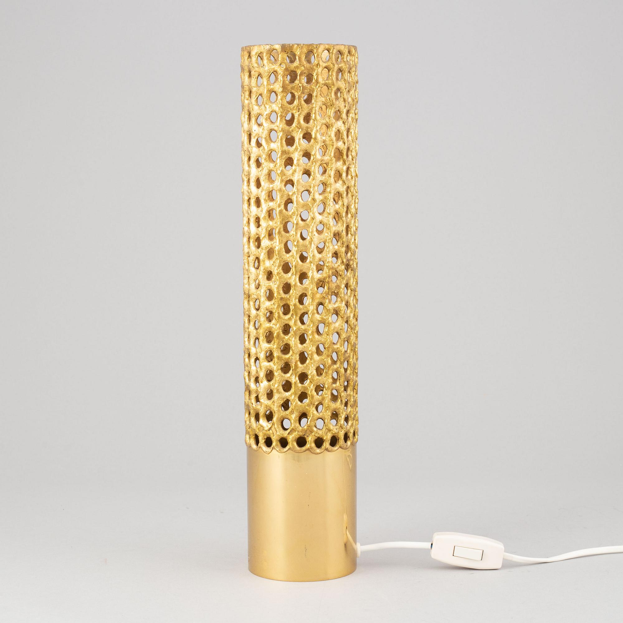 A brass table lamp by Pierre Forssell, second half of the 20th Century.