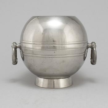 A 1935 pewter wine cooler by GAB.