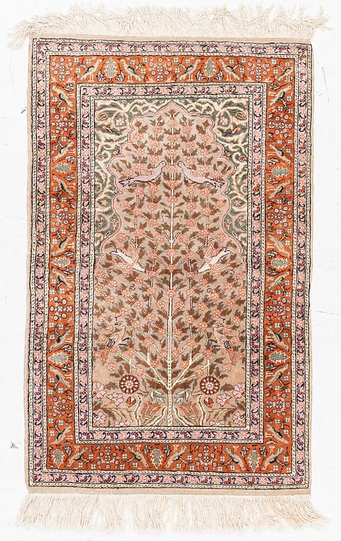 An oriental rug, c. 135 x 85 cm.