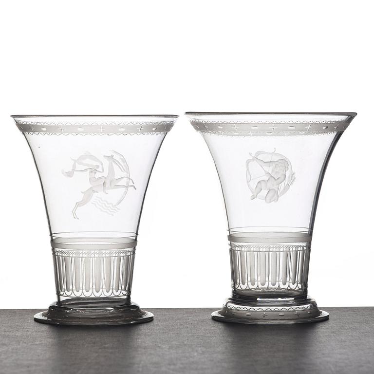 Simon Gate, two Swedish Grace engraved glass beakers, Orrefors, Sweden 1924.