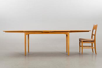 A CARL MALMSTEN DINING TABLE and CHAIRS, 7 parts.