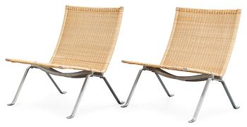 A pair of Poul Kjaerholm 'pk-22' steel and cane easy chairs, Fritz Hansen, Denmark 1995.