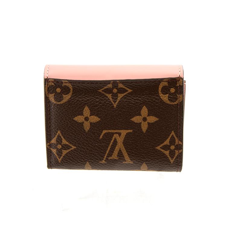 Louis Vuitton, "Zoe" Wallet and Bracelet.