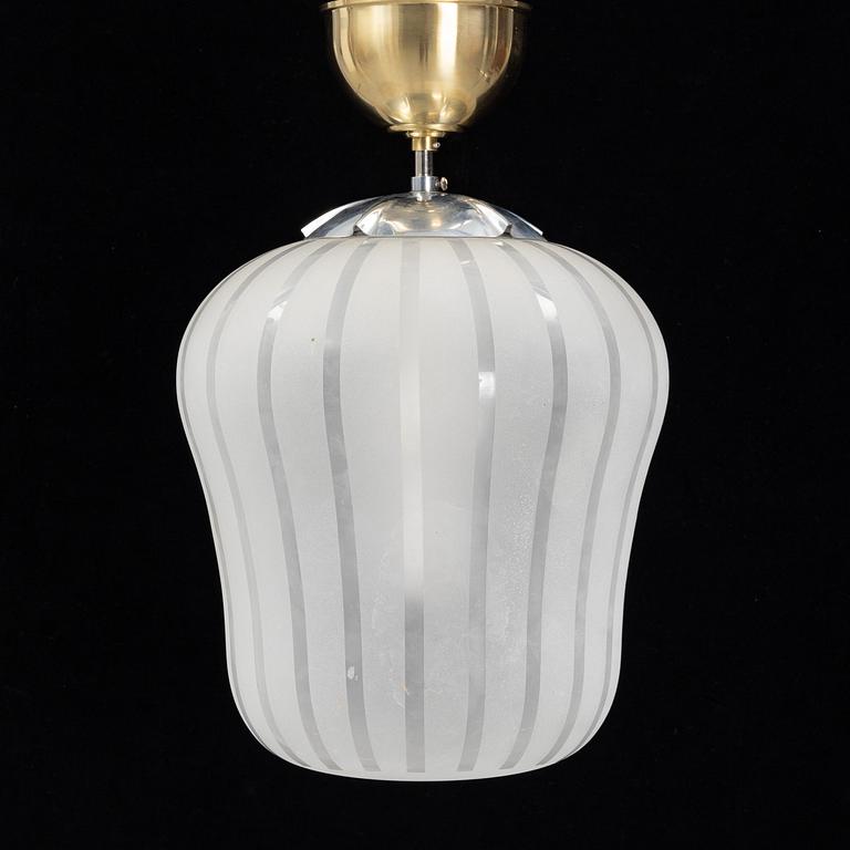 A Swedish Modern glass and brass ceiling light, Orrefors, 1940's.