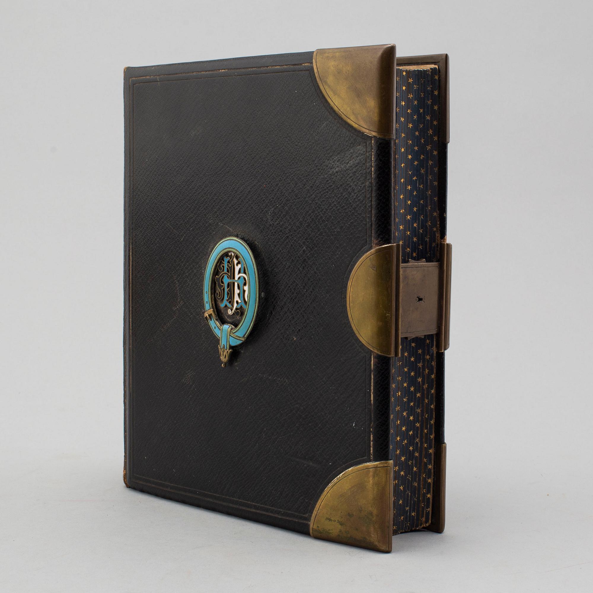 A PHOTO ALBUM, ca 150 photos, secod half of the 19th century.