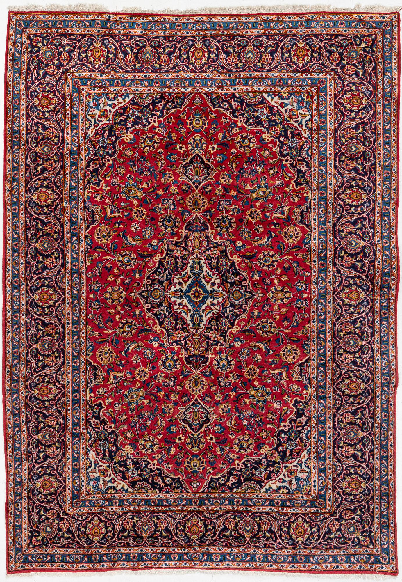 An oriental carpet, c. 340 x 240 cm.