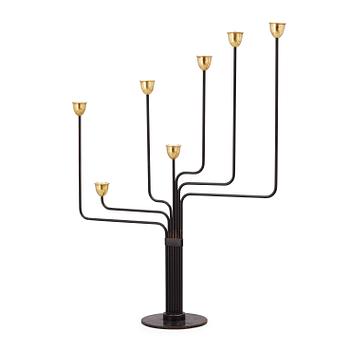 28. A Piet Hein brass and black lacquered metal candelabrum, 1950's-60's.