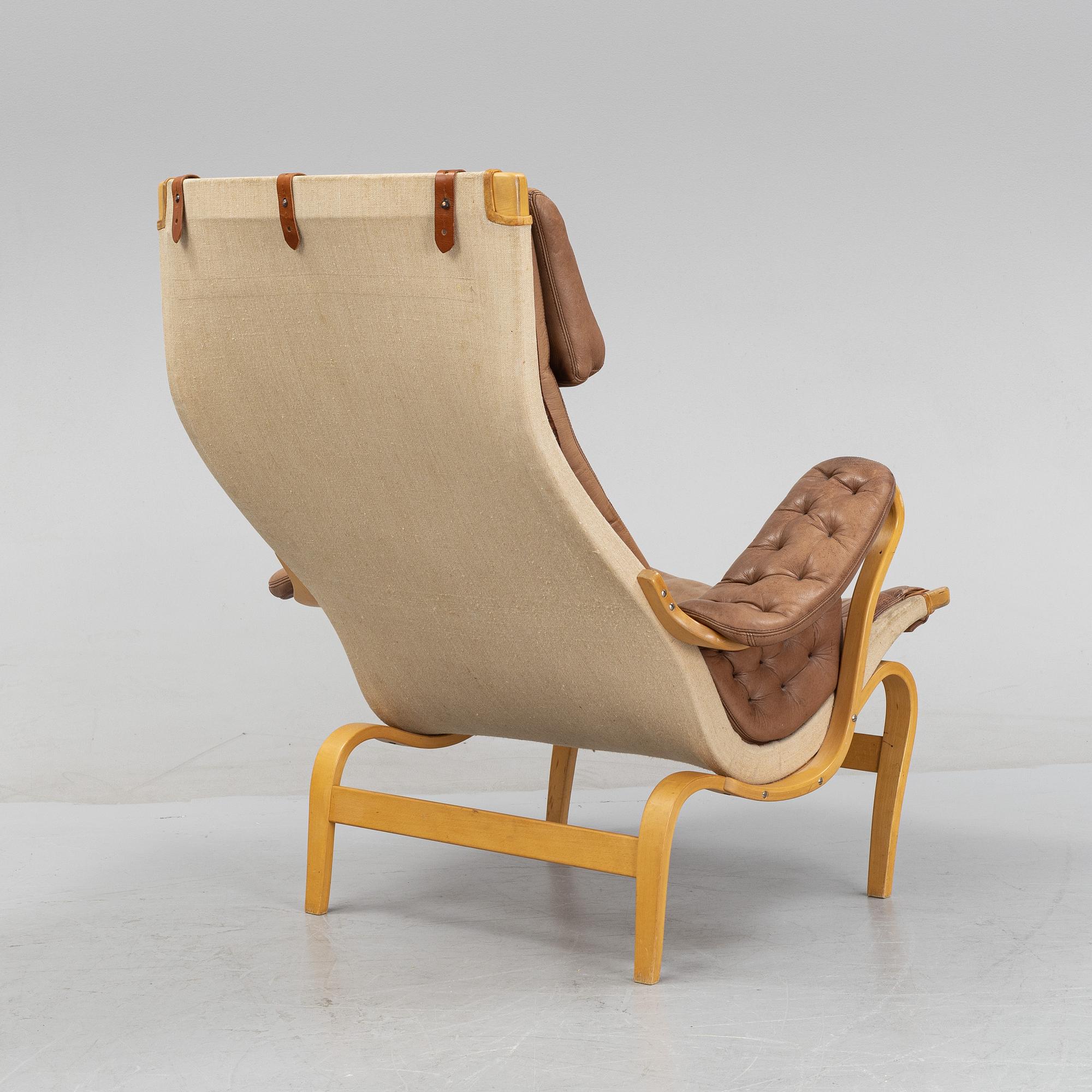 A 'Pernilla' lounge chair by Bruno Mathsson for Dux, end of the 20th Century.