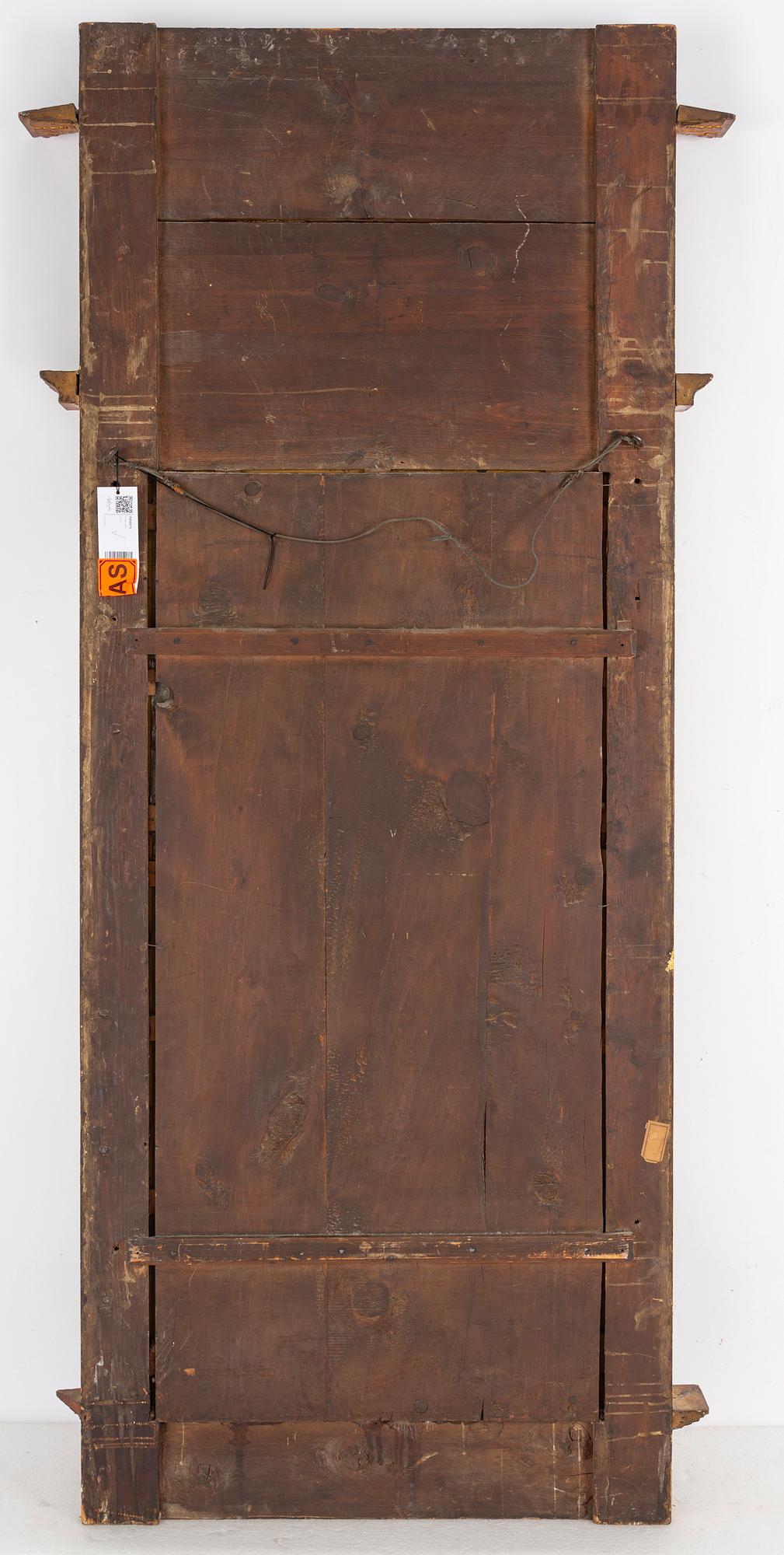 An Empire mirror, first half of the 19th century.