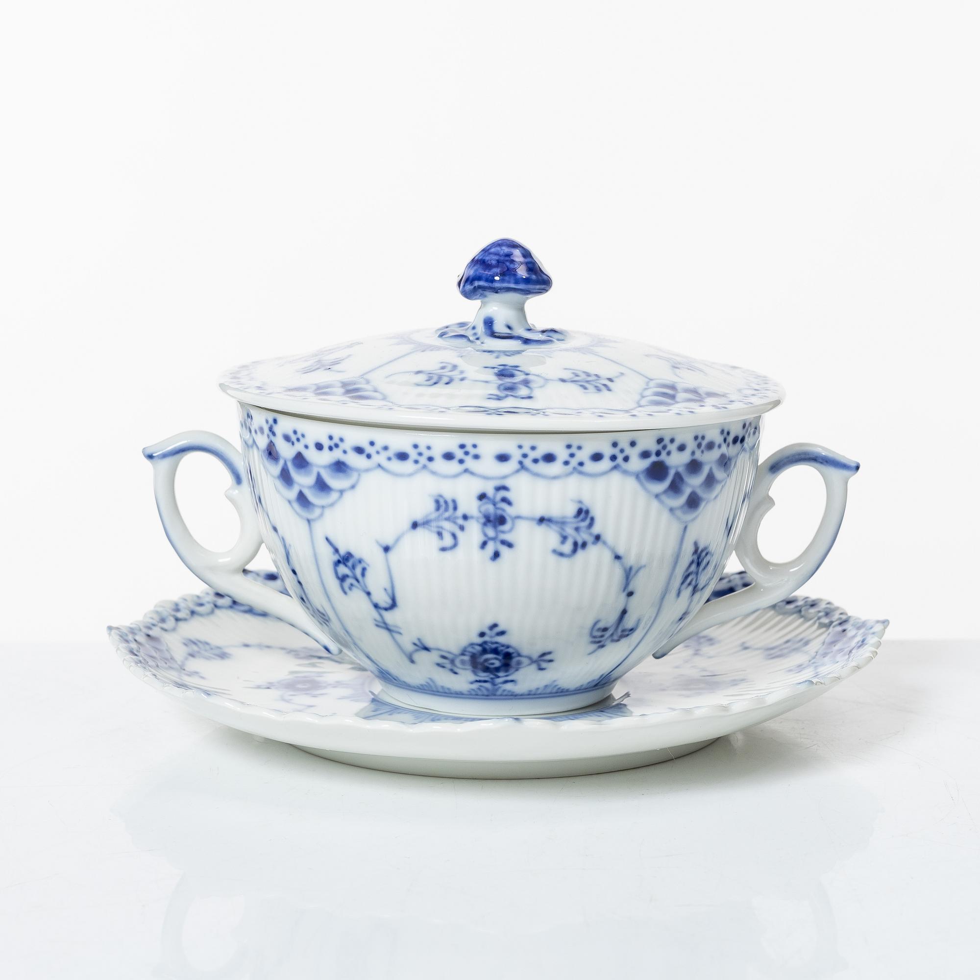 Royal Copenhagen, twelve consommé cups with saucers, 'Blue Fluted Half Lace', Denmark.