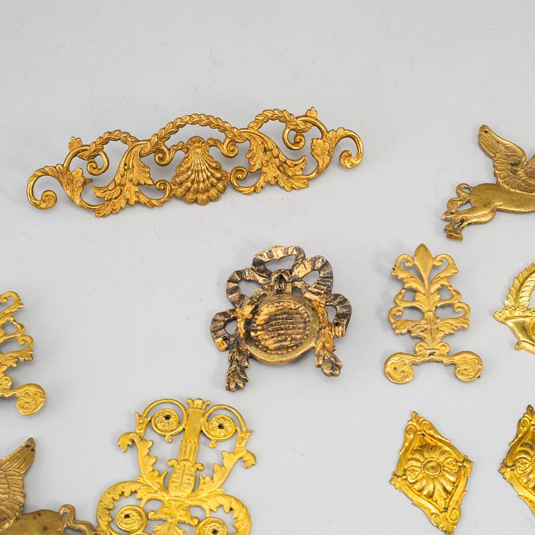 Furniture mountings, 17 parts, brass, 19th-20th century.