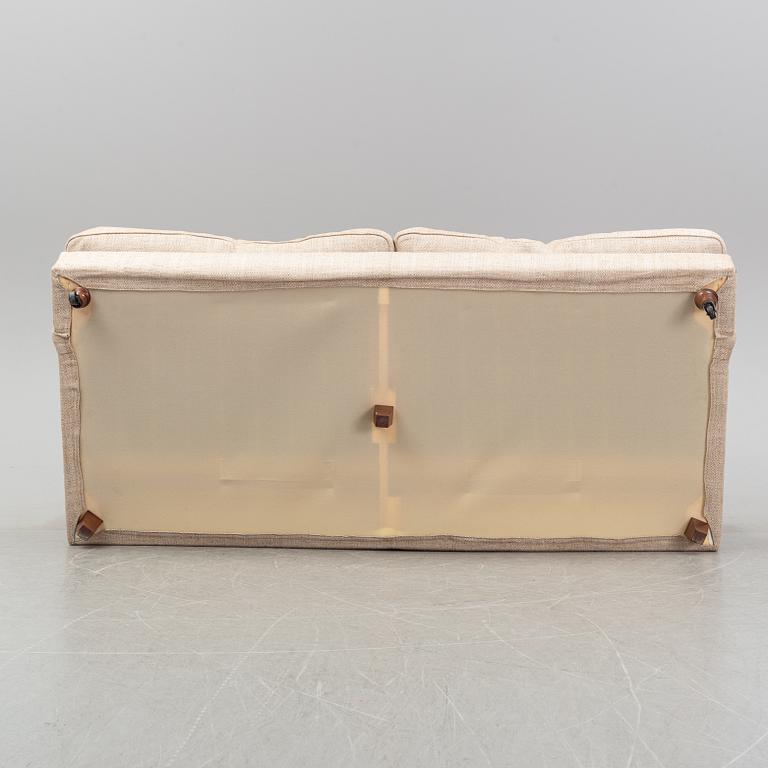 A 'Raffles' sofa designed by Vico Magistretti in 1988 for DePadova.