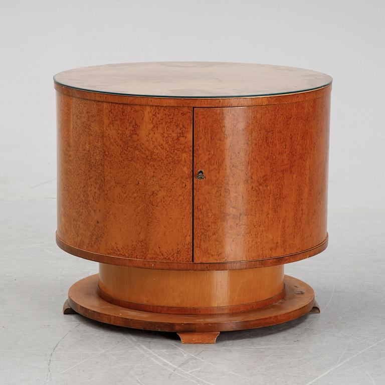 A mid 20th Century birch drinks table.