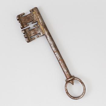 A metal key 17/18th century.