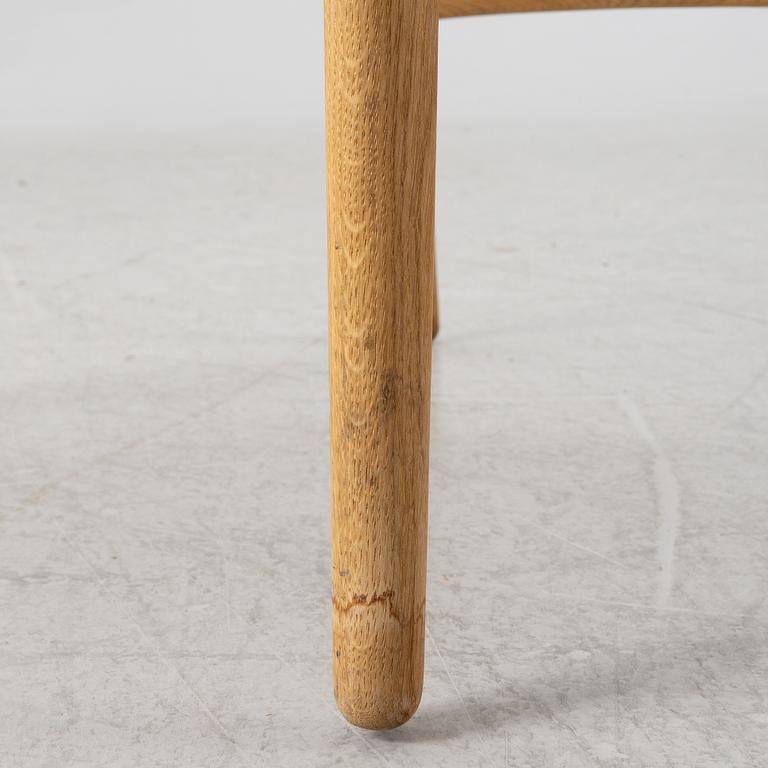 Hans J. Wegner, a CH26 chair, Carl Hansen & Son, Denmark, 21st century.