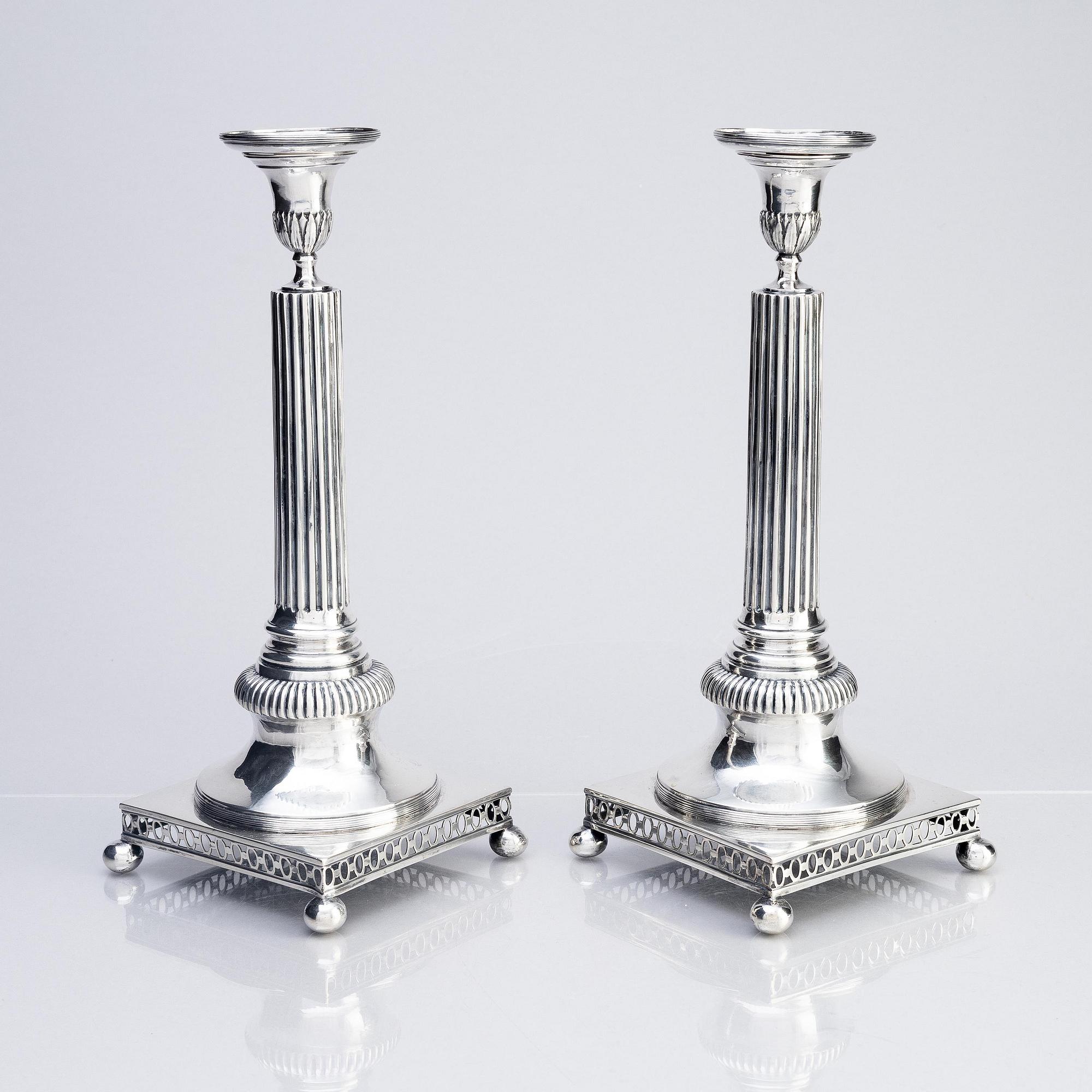 A pair of Swedish 18th century Gustavian silver candlesticks, mark of Arvid Floberg, Stockholm 1798.