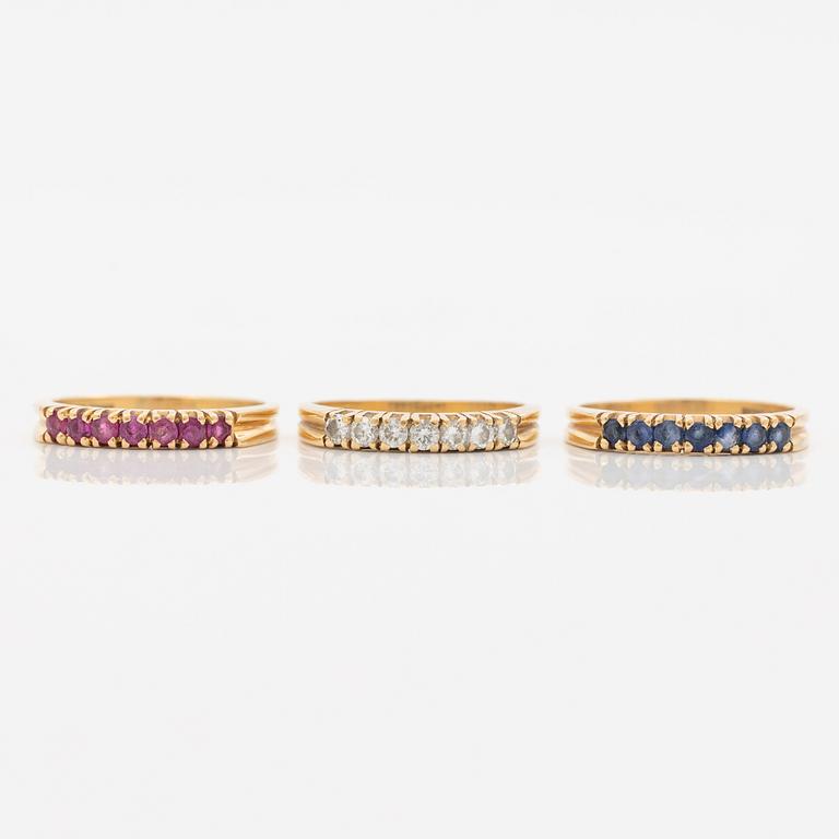 Three rings, 18K gold with sapphires, brilliant-cut diamonds and rubies.