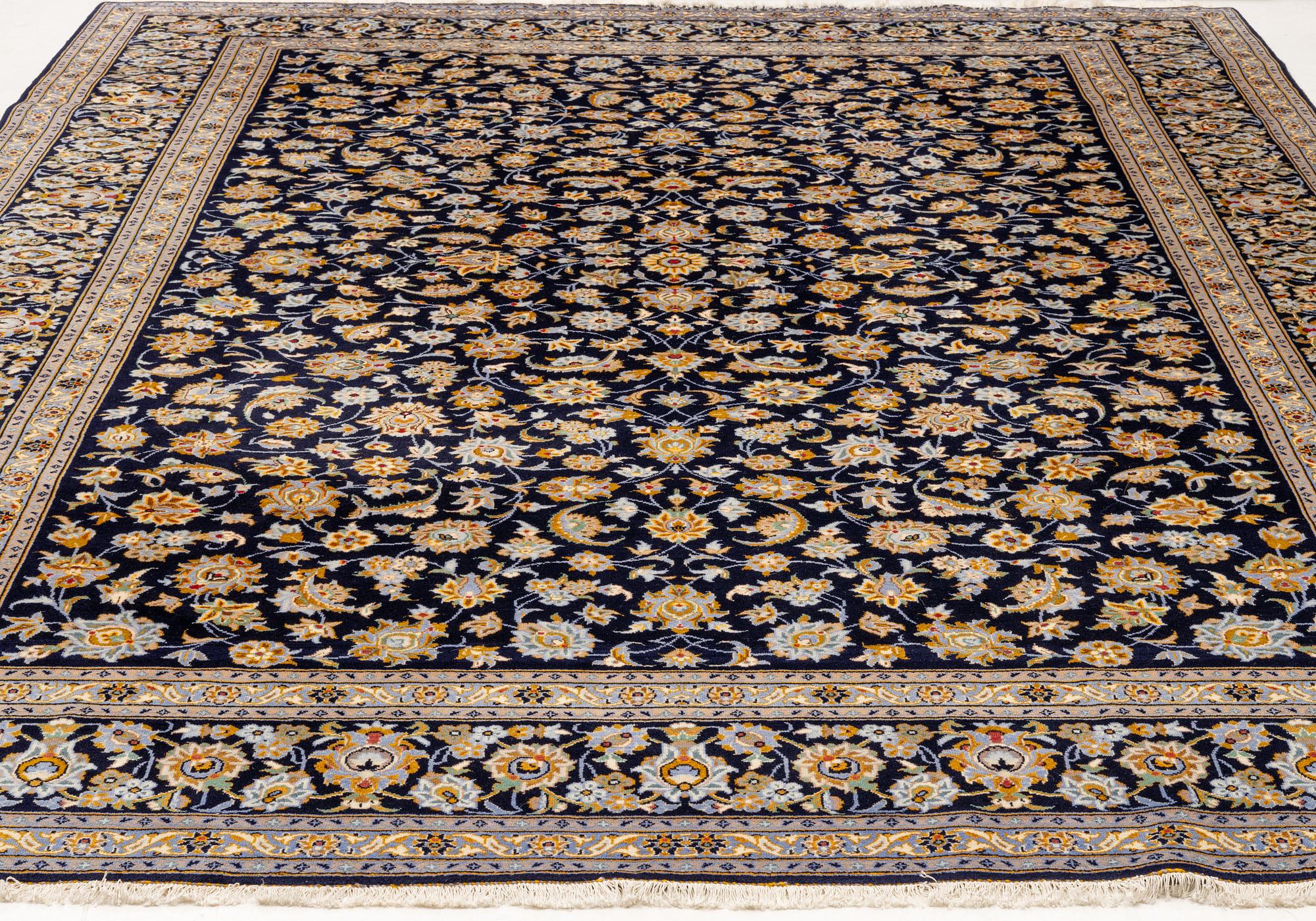 A Keshan carpet, approx. 405 x 300 cm.