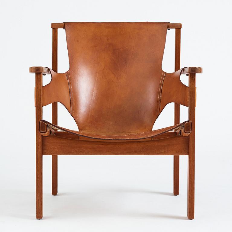 Carl-Axel Acking, a "Trienna" oak and natural leather easy chair, for Nordiska Kompaniet, Sweden 1960's.