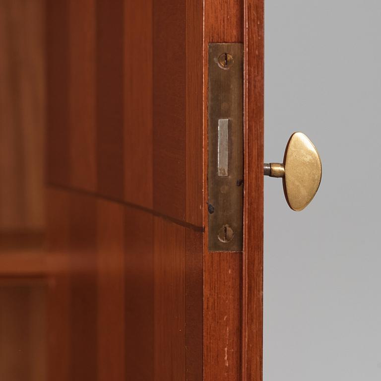 David Rosén, a mahogany and teak cabinet, for Stockholm's Association of Crafts, signed and dated 1959.