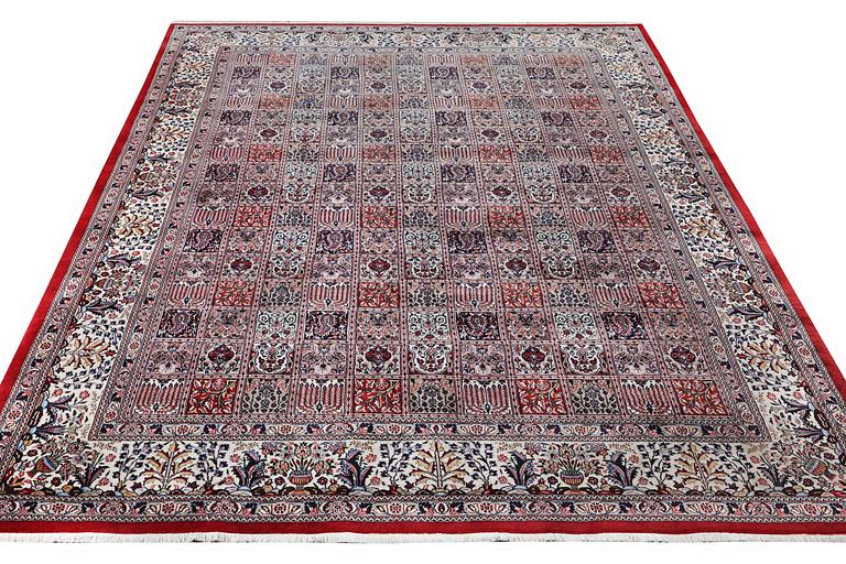 An oriental carpet, c. 346 x 251 cm.